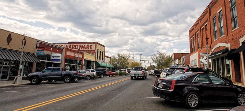 Attorney meeting with a family at the Pell City office of Russo, White & Keller